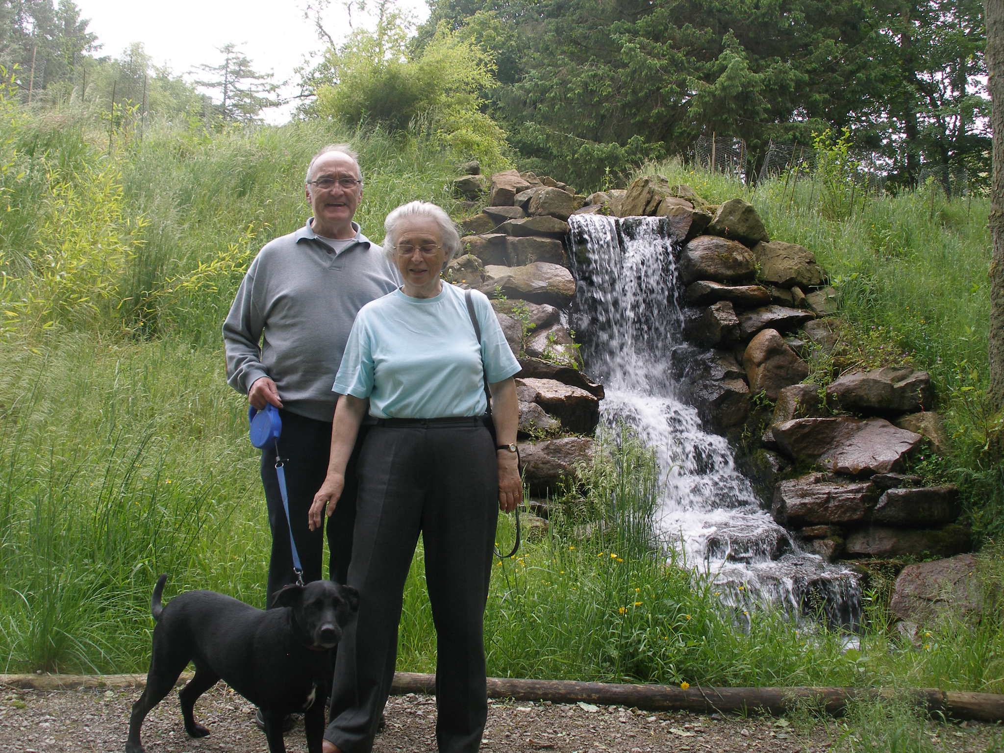 Picture of Anne Maurice and Ash beside a waterfall